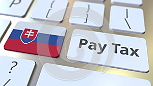 PAY TAX text and flag of Slovakia on the buttons on the computer keyboard. Taxation related conceptual 3D rendering