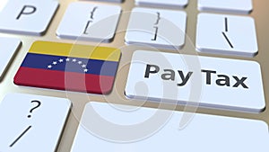 PAY TAX text and flag of Venezuela on the buttons on the computer keyboard. Taxation related conceptual 3D rendering