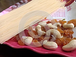 Payasam mix consists of nuts and semiya vermicelli in a plate.