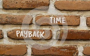 Payback time symbol. Concept words Payback time on brown brick wall. Beautiful brown brick wall background. Business and payback