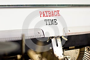 Payback time symbol. Concept words Payback time typed on old retro typewriter. Beautiful white background. Business and payback