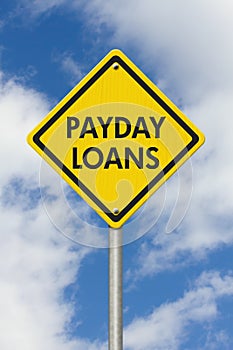 Payday Loans yellow warning highway road sign