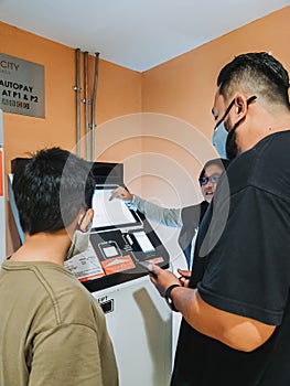 Paying for parking using QR Code in IOI City Mall. Modern technology