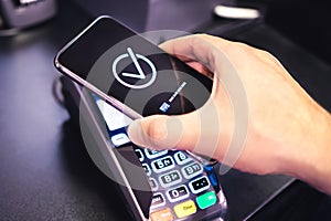 Paying with phone. Contactless payment with smartphone. Digital mobile wallet. Wireless nfc money transaction in store, shop.