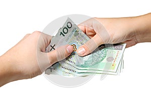 Paying with polish banknotes - 100 zloty photo