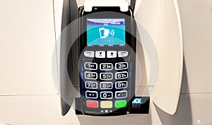 Paying self service kiosk device with credit card for pay movie ticket, food and drink. Business payment terminal for moneyless