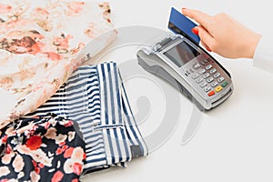 Paying through smartphone using NFC technology. payment by phone through the terminal