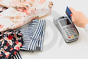 Paying through smartphone using NFC technology. payment by phone through the terminal