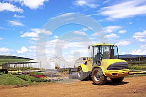 Payloader Utilized For Heavy Lifting At Commercial Horticultural