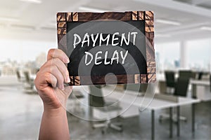 Payment delay on chalkboard photo