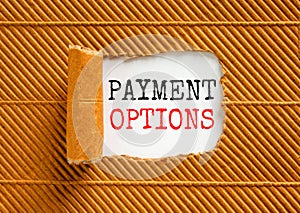 Payment options symbol. Concept words Payment options on beautiful white paper. Beautiful brown background. Business payment