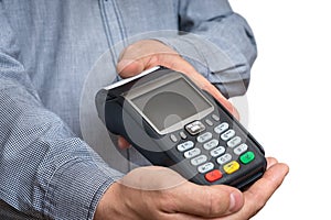 Payment terminal in hand of man isolated on white