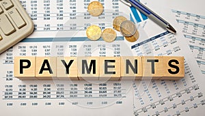 PAYMENTS word from wooden blocks