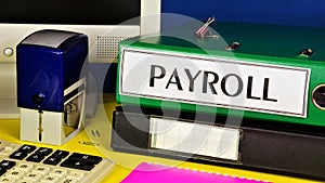 Payroll accounting. The text label in the folder office of the Registrar. photo