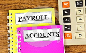 Payroll and accounts. Text labels on the folders of accounting documents