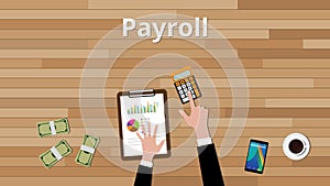 Payroll concept with businessman working on some paper document with calculator and paper document with graph and chart