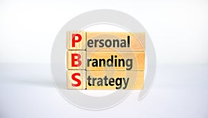 PBS, Personal branding strategy symbol. Concept words PBS, Personal branding strategy on wooden blocks on a beautiful white photo