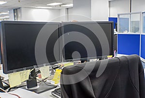 PC computer connecting monitor in office with chair for employee