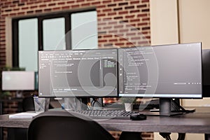 Pc desk with pc monitors running terminal window