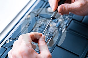 Pc repair service. Computer technician service with laptop on hardware technology background. Maintenance engineer