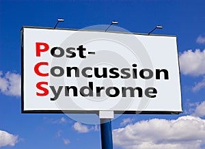 PCS post-concussion syndrome symbol. Concept words PCS post-concussion syndrome on big white billboard against beautiful blue sky