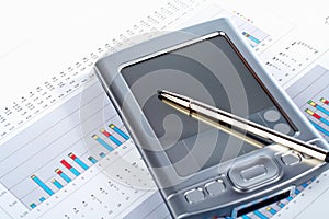 PDA on market financial chart background photo