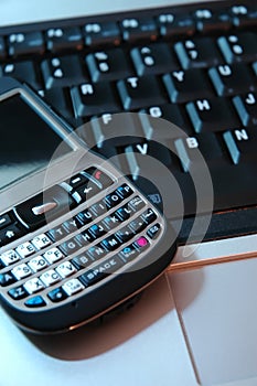 Pda Phone on Laptop Keyboard