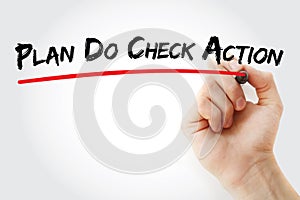 PDCA - Plan Do Check Action acronym with marker, concept background