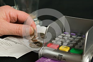Pdq payment machine with hand and cash