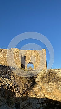 PeÃ±arroya Castle is a fortification located in the municipality of Argamasilla de Alba, Spain