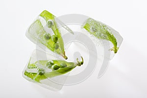 Pea pods frozen in ice cubes