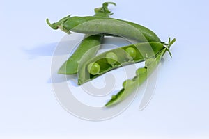 Pea pods and green peas photo