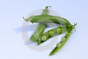 Pea pods and green peas photo