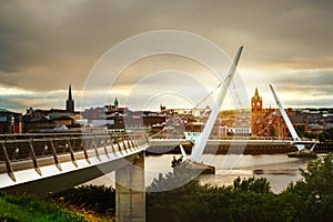 Peace bridge in Derry Londonderry in Northern Ireland with city center