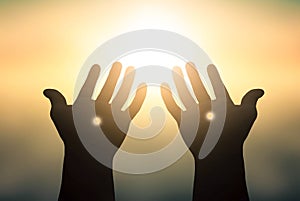 Peace concept: Silhouette Jesus Christ open spiritual hands