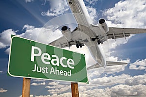 Peace Green Road Sign and Airplane Above