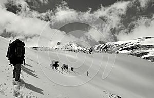 Winter landscape on the mountain. Hikers, snow, peace at high altitude - Erciyes volcano, landmark attraction in Turkey