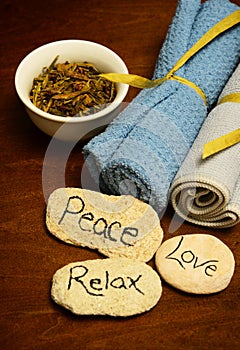 Peace, love and relax words and spa products