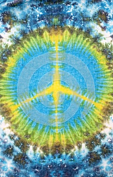 Peace sign tie dyed pattern on cotton fabric for background.