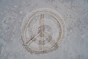 A peace sign was  drawn in the sand