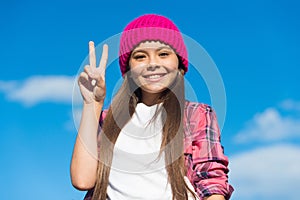 Peace will be victorious. Happy kid show V sign sunny sky. World Peace Day. Peaceful childhood. September 21. Love and