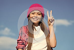 Peace will be victorious. Happy kid show V sign sunny sky. World Peace Day. Peaceful childhood. September 21. Love and