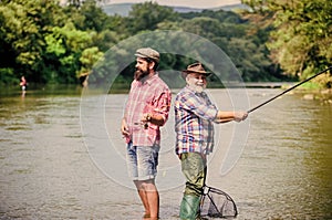 Peaceful activity. Nice catch. Rod and tackle. Fisherman fishing equipment. Fisherman grandpa and mature man friends