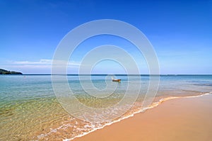 Peaceful beach with boat