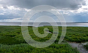 Peaceful beach dunegrass and storm clouds