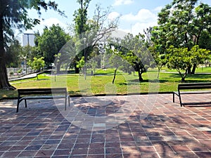 Peaceful benches: Tranquil Afternoon at Alcalde Park in Guadalajara photo