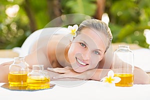 Peaceful blonde lying on towel