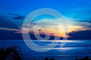 Peaceful blueish sunset by the sea in the island of Koh Phangan