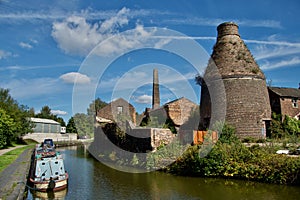 The peaceful canal and the Old Pottery factory architecture