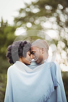 Peaceful couple standing nose to nose